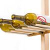 2 Vino Rails en dorado como parte del sistema de postes Vino Series